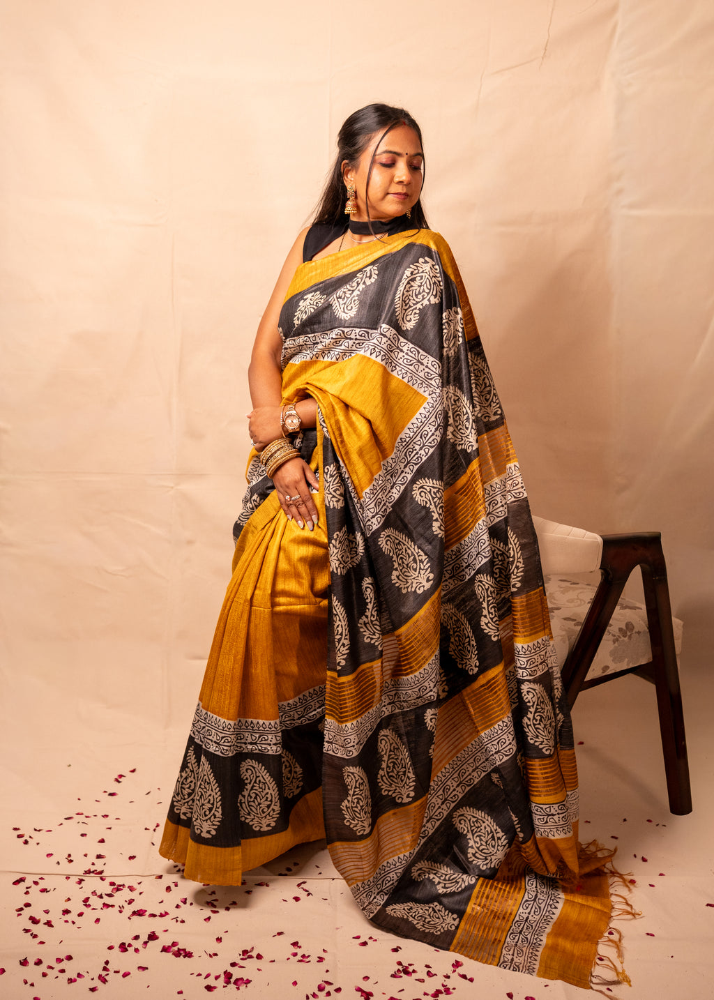 Kanak Yellow & Black Gheecha Silk Saree