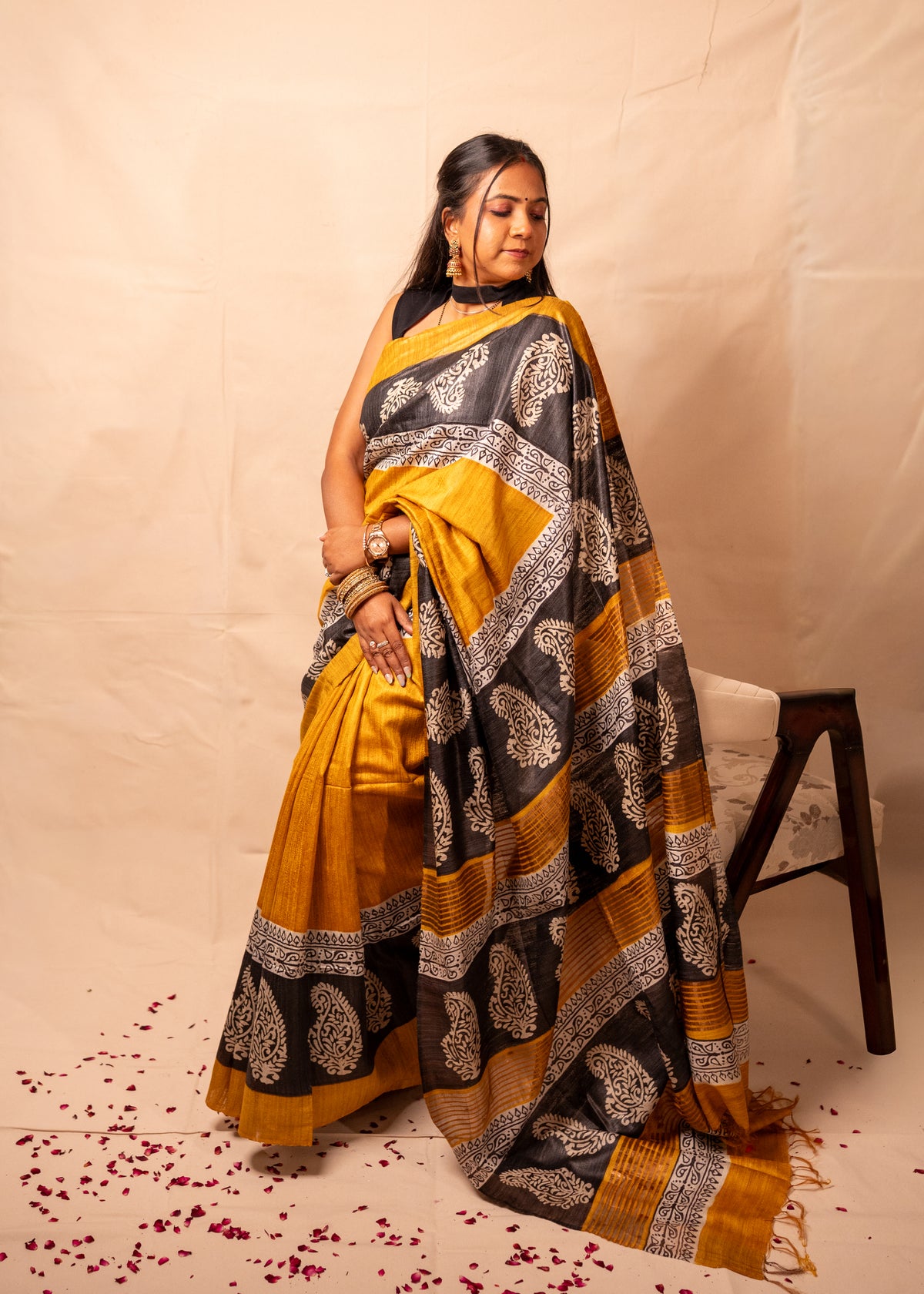 Kanak Yellow & Black Gheecha Silk Saree