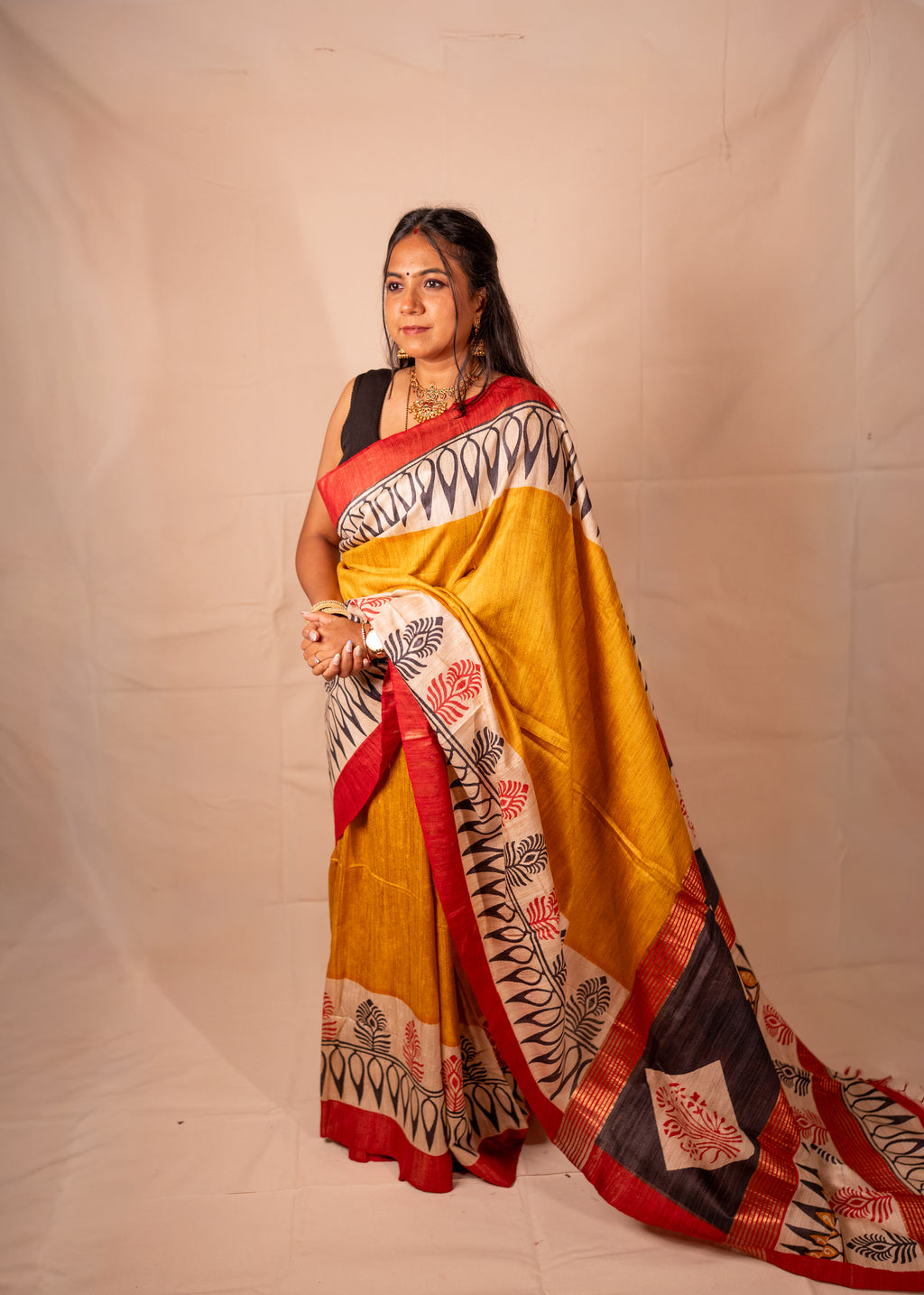 Abhira Yellow, Black & Red Gheecha Silk Saree